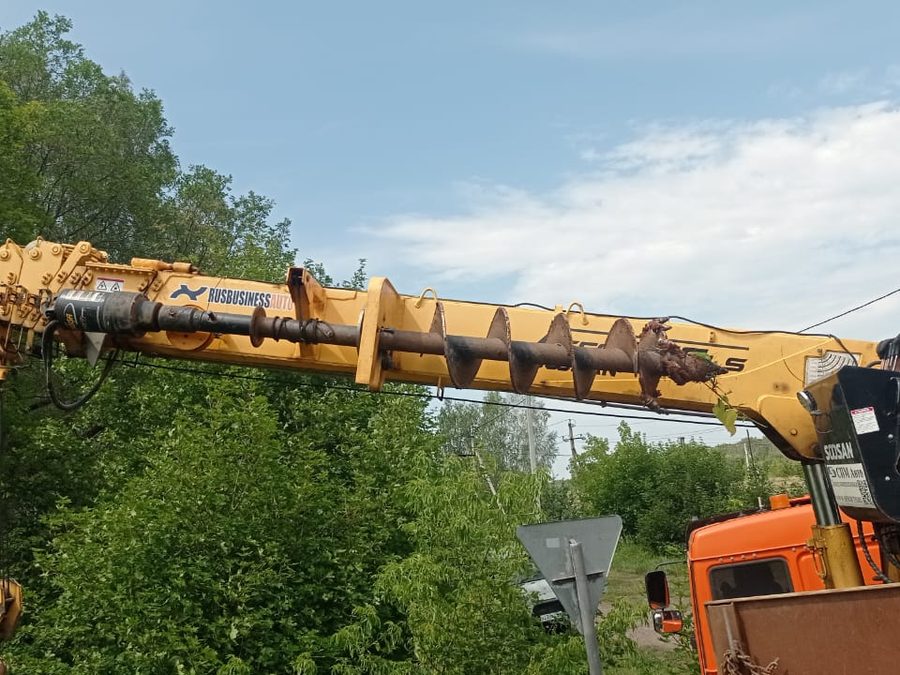 Pole installation with a truck crane